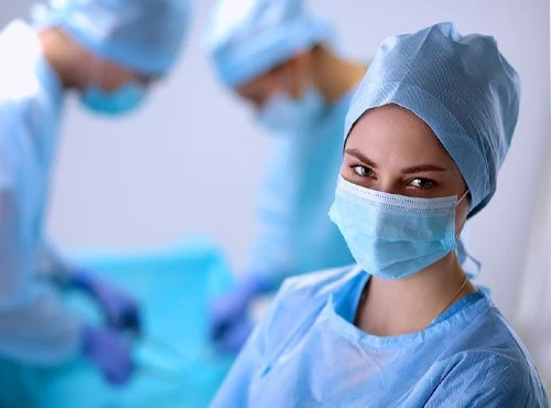 Medical Professionals in Sterile Attire Medical Professionals in Sterile Attire